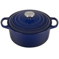 An indigo/ blue colored 5 - 1/2 Quart Le Creuset Signature Enameled Cast Iron Round French/Dutch Oven