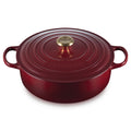 A Rhone / burgundy red 6-3/4 Quart Le Creuset Signature Enameled Cast Iron Low Round French/Dutch Oven