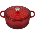 A cerise / red colored 3-1/2 Quart Le Creuset Signature Enameled Cast Iron Round French/Dutch Oven