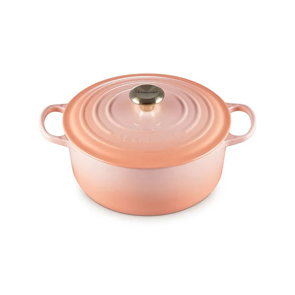 An peche/ peach colored 5 - 1/2 Quart Le Creuset Signature Enameled Cast Iron Round French/Dutch Oven