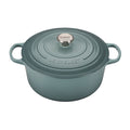 A seasalt/ green colored 7 - 1/4 Quart Le Creuset Signature Enameled Cast Iron Round French/Dutch Oven
