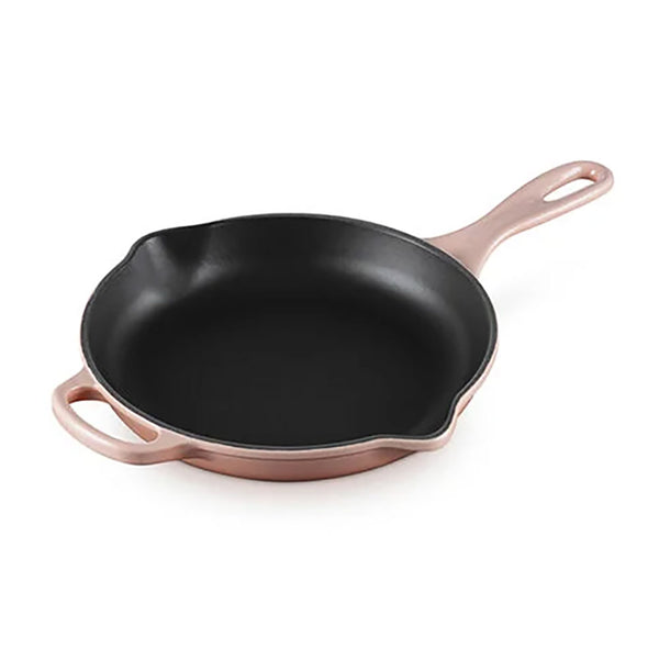 A Peche/peach colored Le Creuset Signature Enameled Cast Iron 9