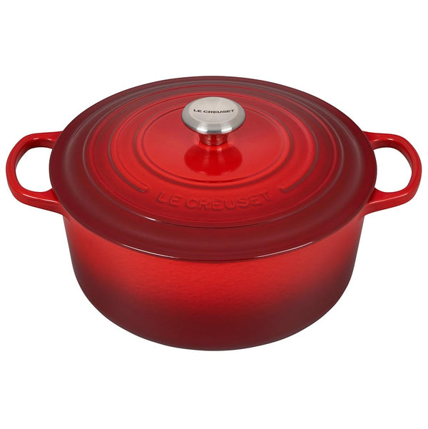 A cerise/ red colored 7 - 1/4 Quart Le Creuset Signature Enameled Cast Iron Round French/Dutch Oven