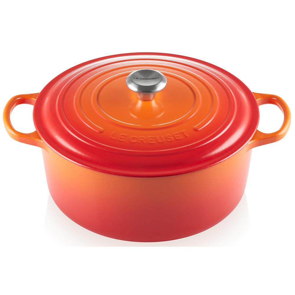 An Orange / Flame Colored 9 Quart Le Creuset Signature Enameled Cast Iron Round French/Dutch Oven