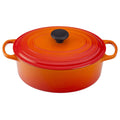 An Orange / Flame Colored 5 Quart Le Creuset Signature Enameled Cast Iron Oval French/Dutch Oven