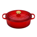 A cerise/ red colored 5 Quart Le Creuset Signature Enameled Cast Iron Oval French/Dutch Oven