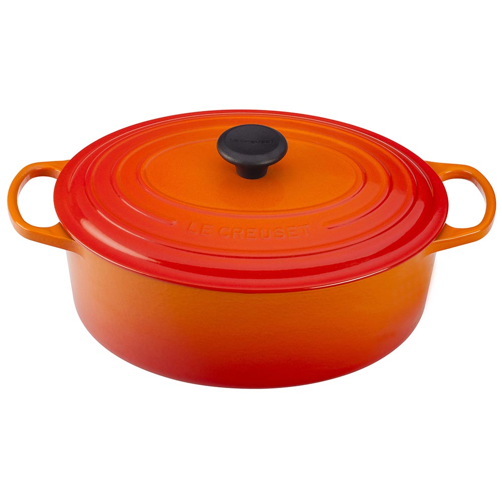 An Orange / flame Colored 6-3/4 Quart Le Creuset Signature Enameled Cast Iron Oval French/Dutch Oven