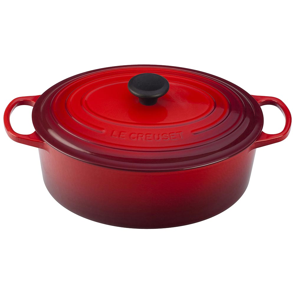 A cerise/ red colored 6-3/4 Quart Le Creuset Signature Enameled Cast Iron Oval French/Dutch Oven