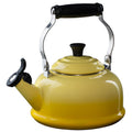 A soleil/ yellow colored Le Creuset Enameled Steel 1.7 Quart Classic Whistling Tea Kettle