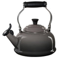 An oyster/ grey colored Le Creuset Enameled Steel 1.7 Quart Classic Whistling Tea Kettle